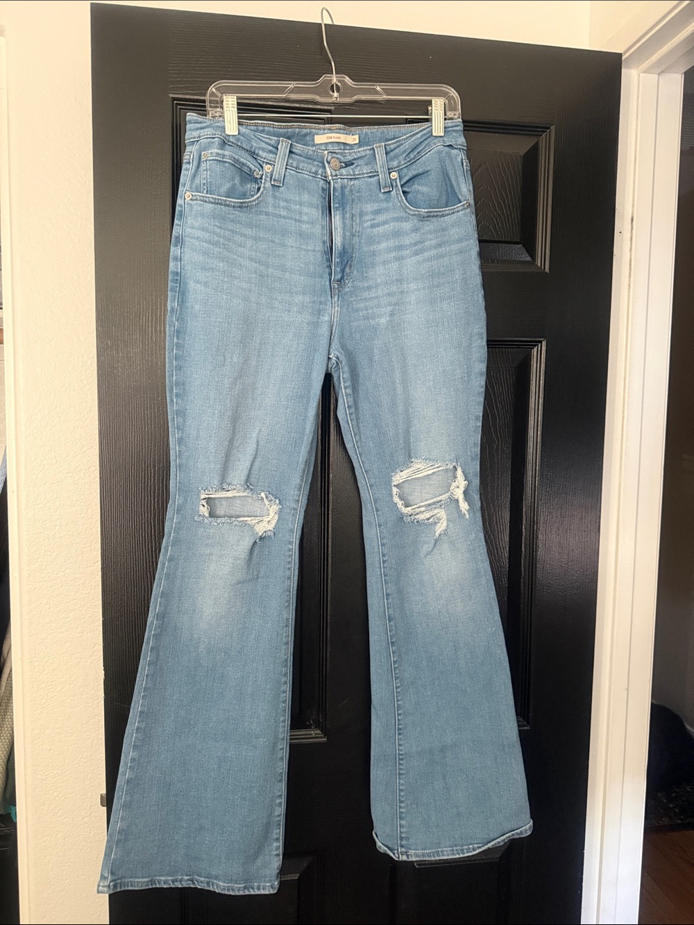 Levi's Light Blue Flare Jeans with Knee Rips